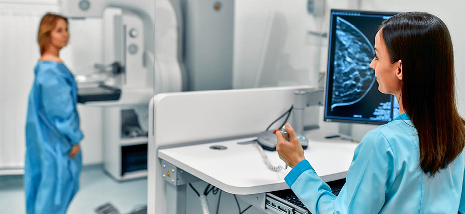 In the hospital, the patient undergoes a screening procedure for a mammogram, which is performed by a mammogram. A modern technologically advanced clinic with professional doctors.